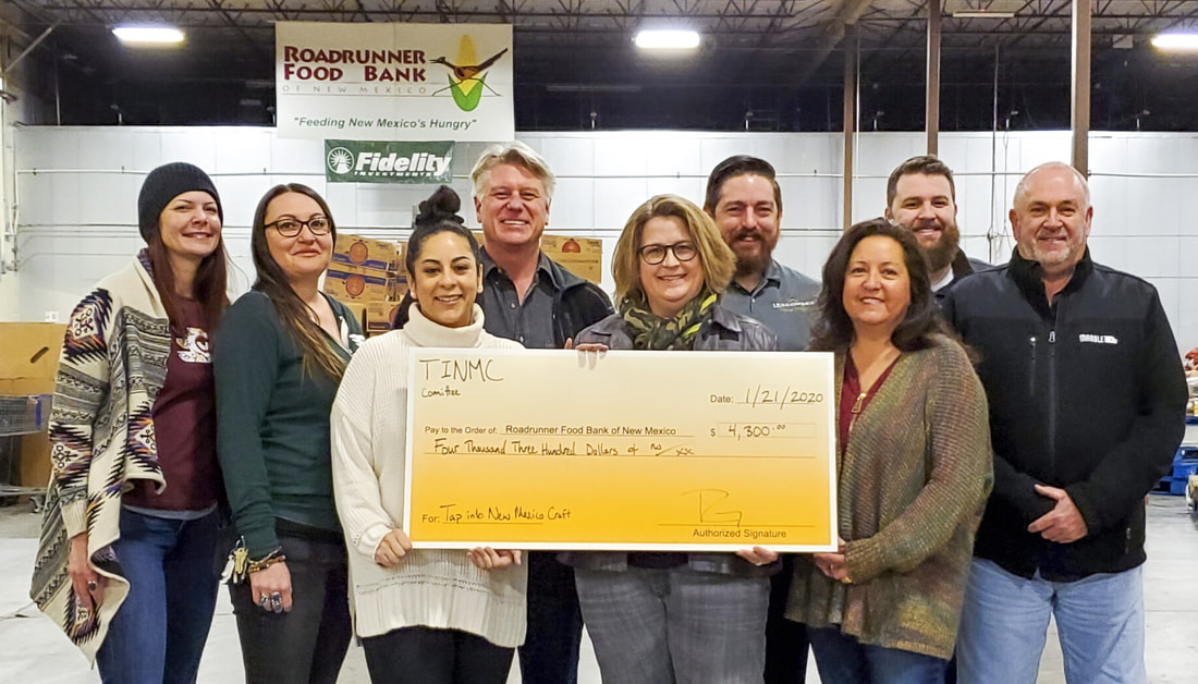 Roadrunner Food Bank presented a check from Tap Into New Mexico Craft partners to help solve hunger in New Mexico